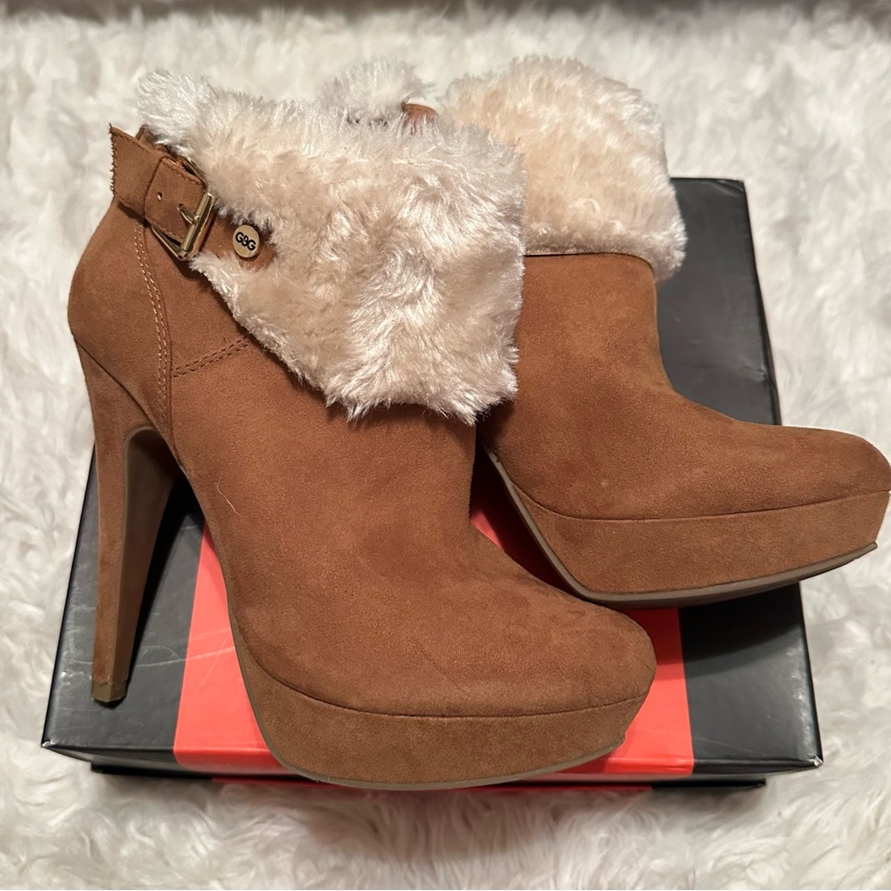 Guess, tan suede bootie with faux fur cuff.  Side zipper.  Size 6 1/2.